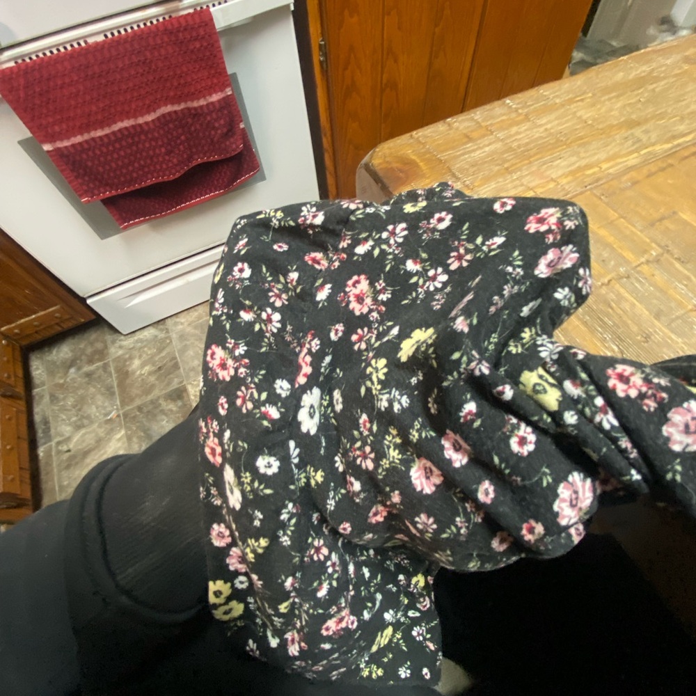 I cute tight, fitted, dressed with beautiful flowers and cute little coconut,